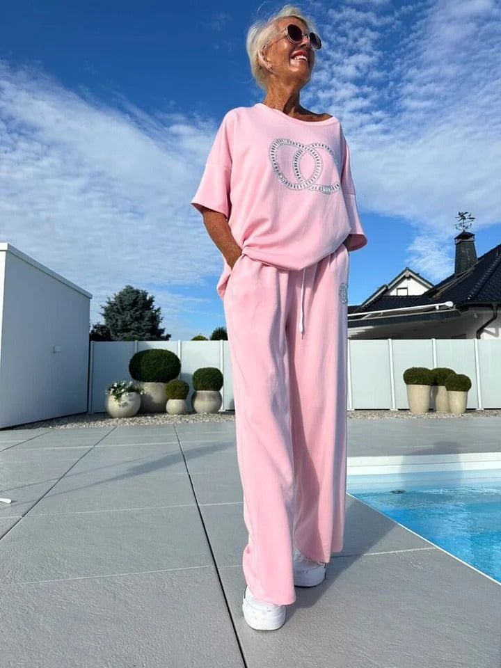 Women's casual two-piece set: solid color sweater paired with loose-fitting trousers